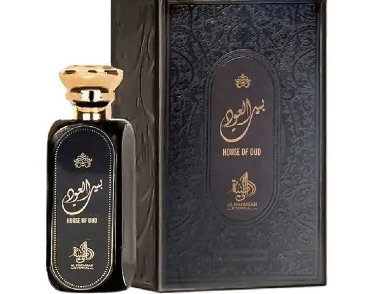 Al Wataniah House Of Oud Al Wataniah Eternal Perfume 100ml — Botol wangian hitam gelap dengan penutup emas, diletakkan di sebelah kotak hitam bertekstur dengan tulisan emas.