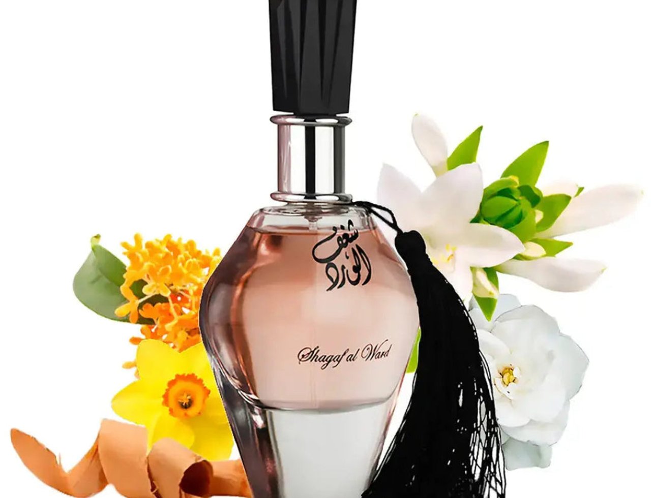 Al Wataniah Shagaf Al Ward by Al Wataniah 100ml EDP Women - botol kaca lutsinar berisi cecair merah jambu, bertutup hitam, dihiasi bunga putih dan kuning serta reben oren