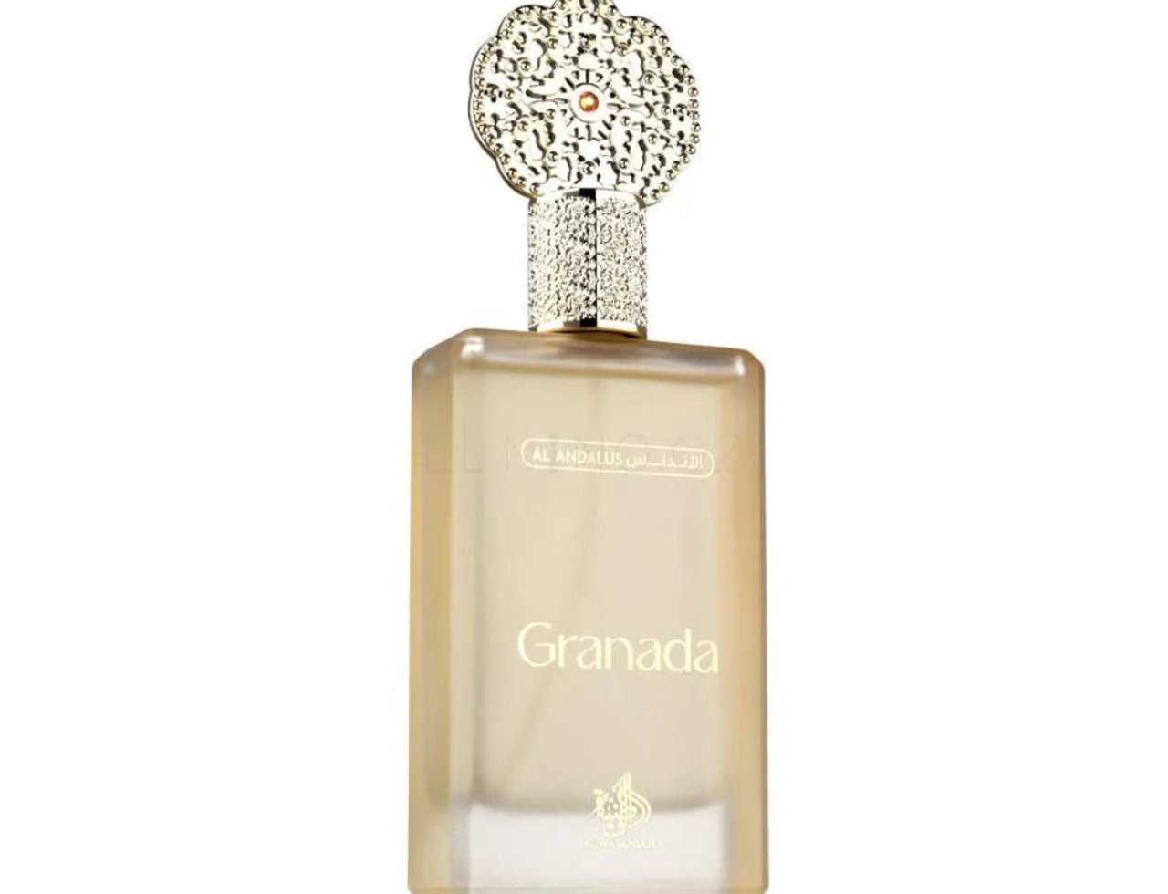 Al Wataniah Granada — A clear glass perfume bottle with a gold ornate cap and the name 'Granada' in gold lettering.