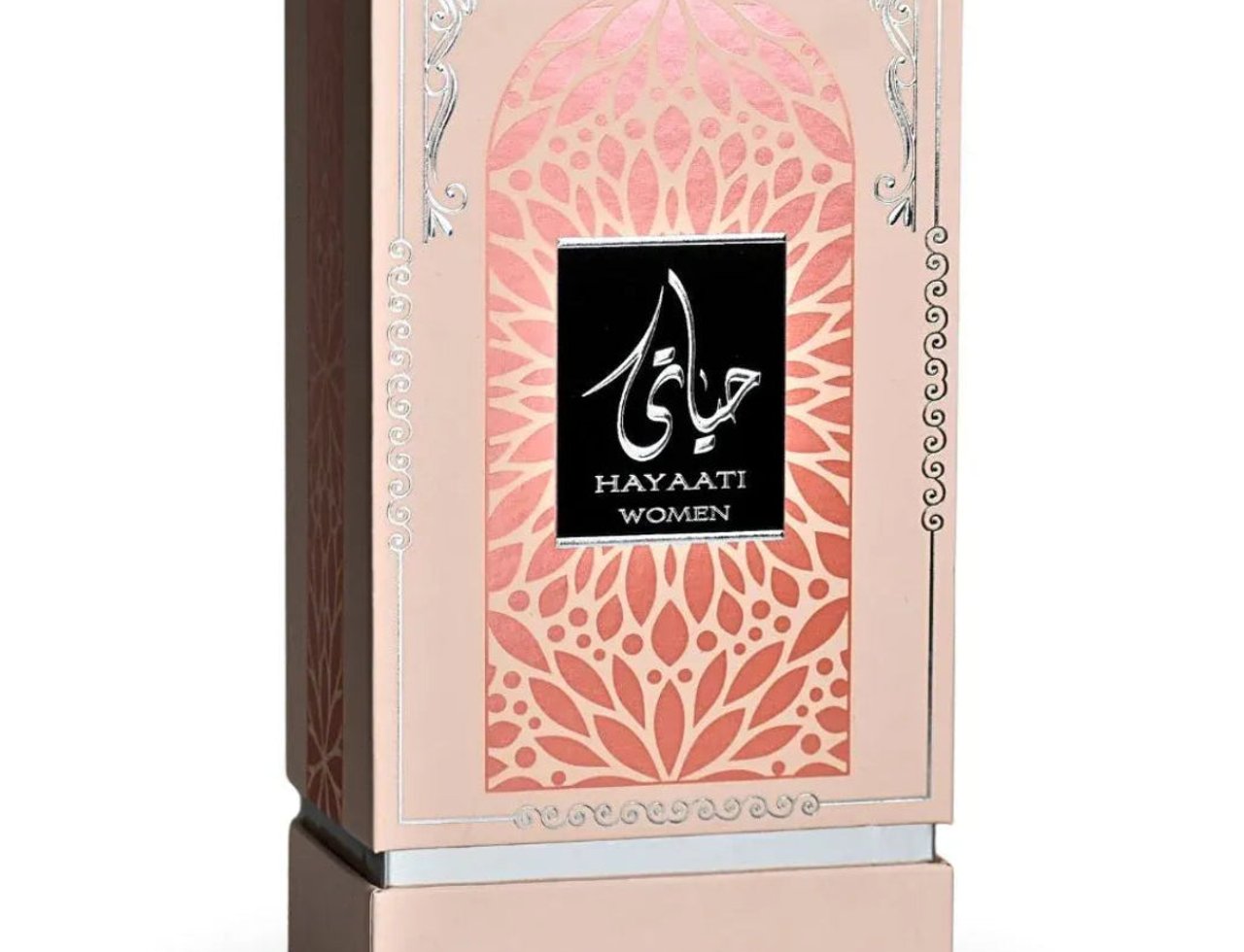 Ard Al Zaafaran Hayaati Women — Pink perfume box with ornate arch and floral pattern, black label with Arabic script and text