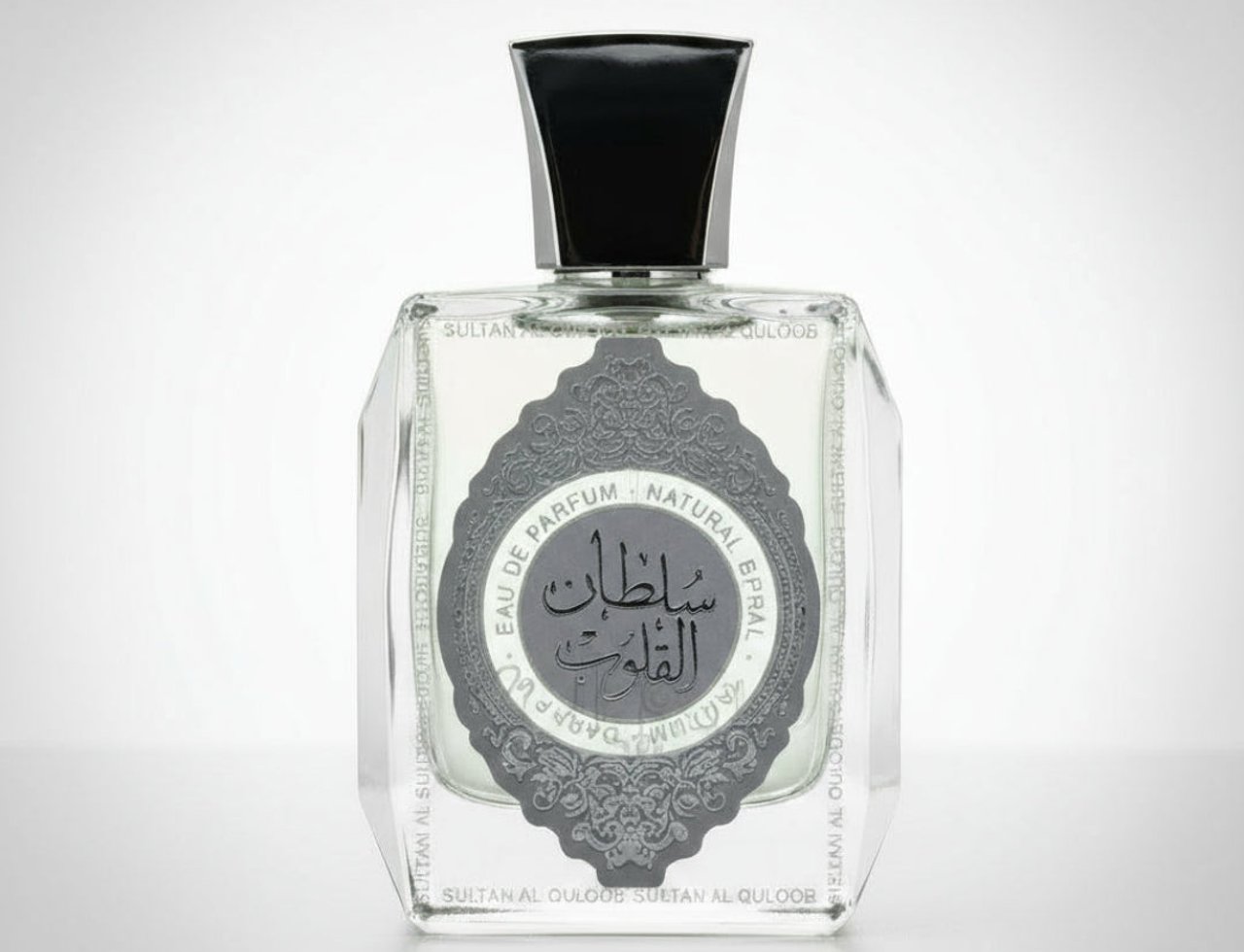Ard Al Zaafaran Sultan Al Quloub — Clear glass perfume bottle with black cap and ornate grey label featuring Arabic script.