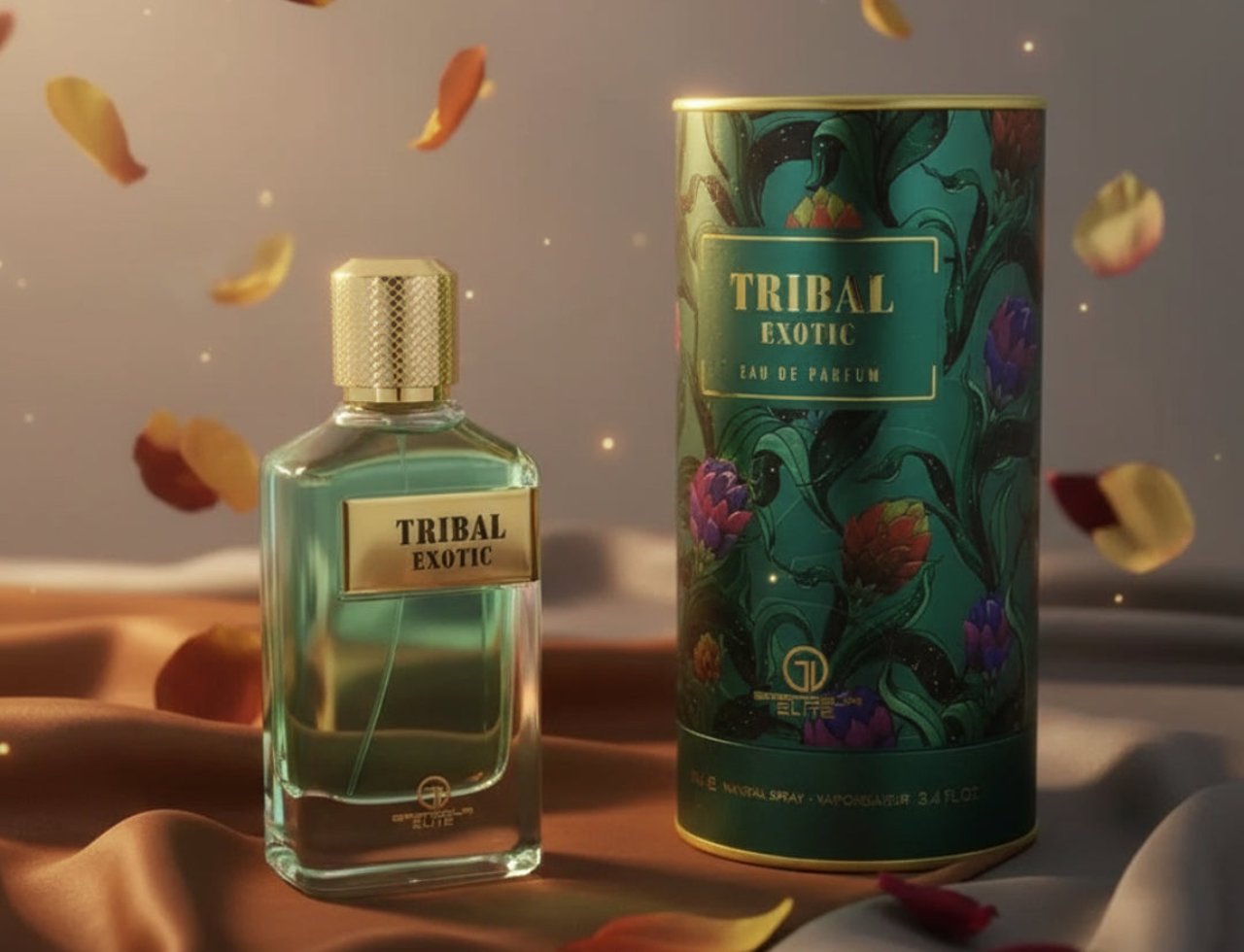 Grandeur Tribal Exotic by Grandeur 100ml EDP Men — A clear glass perfume bottle with a gold cap sits next to its green, floral-patterned cylindrical box, surrounded by floating rose petals.
