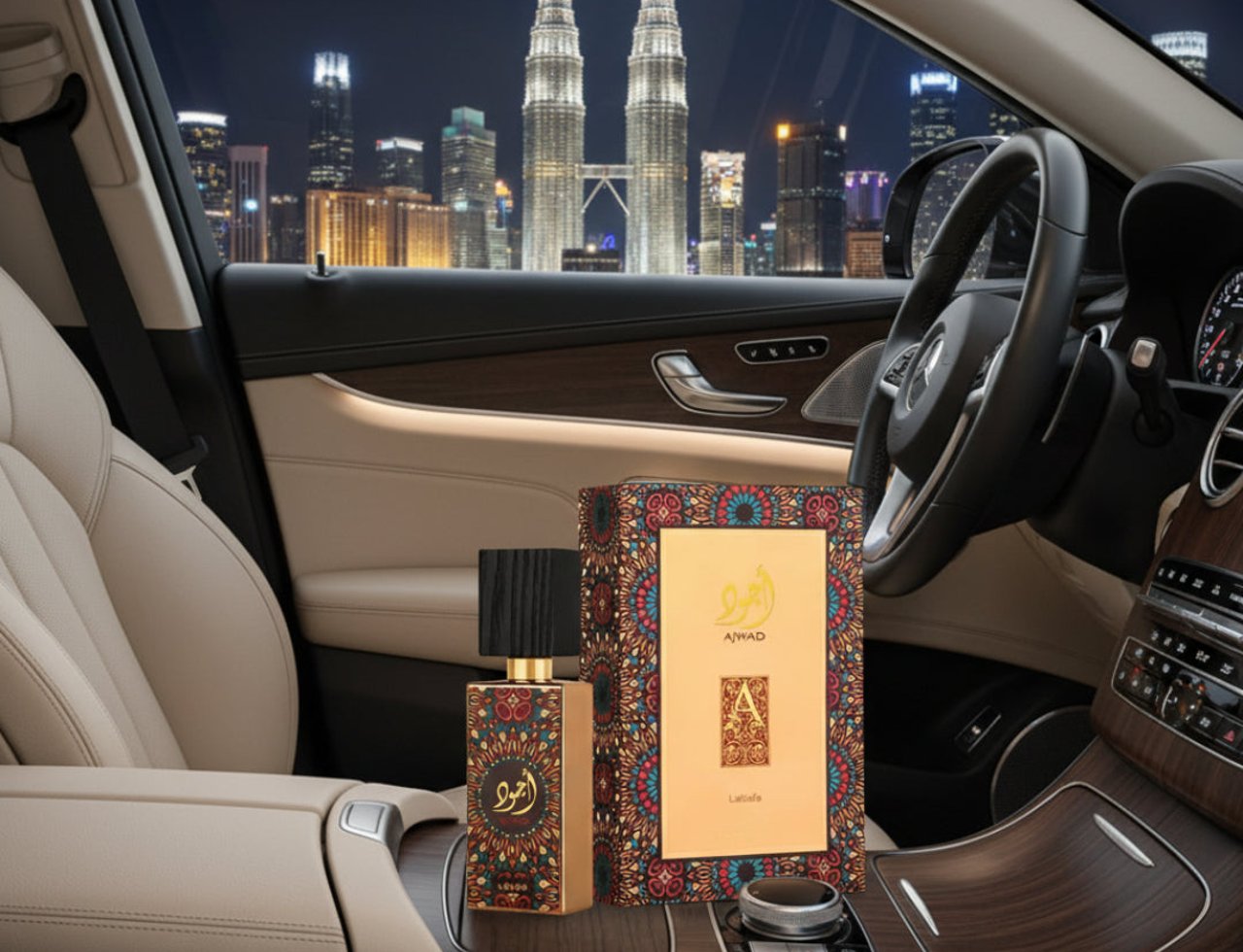 Lattafa Ajwad by Lattafa EDP 60ml Unisex — Botol dan kotak wangian Lattafa Ajwad diletakkan di atas konsol kereta mewah dengan pemandangan bandaraya Kuala Lumpur pada waktu malam di luar tingkap.