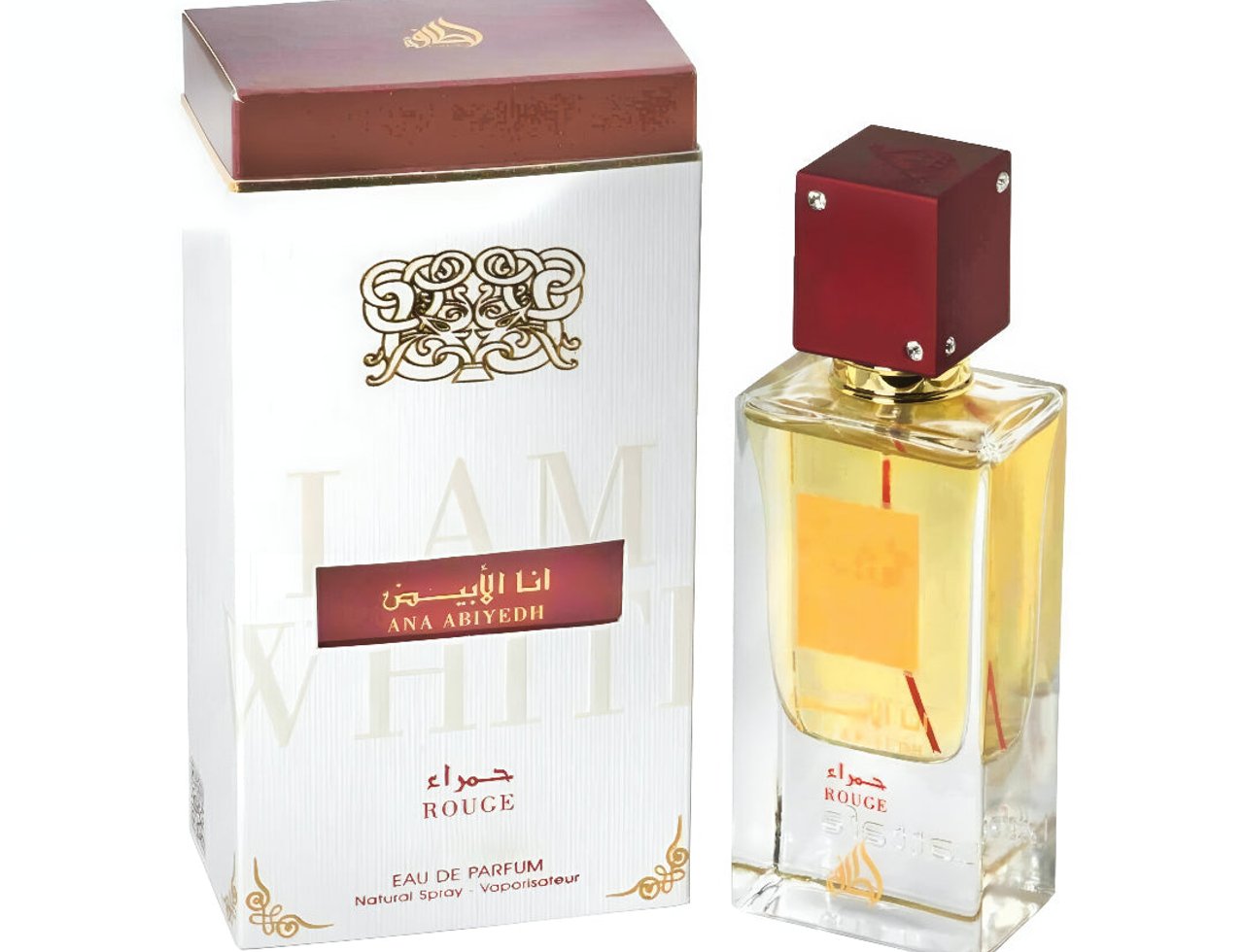 Lattafa Ana Abiyedh Rouge Lattafa 100ml EDP — Set wangian bersama kotak putih berhias emas dan botol kaca jernih berisi cecair kuning keemasan, lengkap dengan penutup merah bergemerlapan.