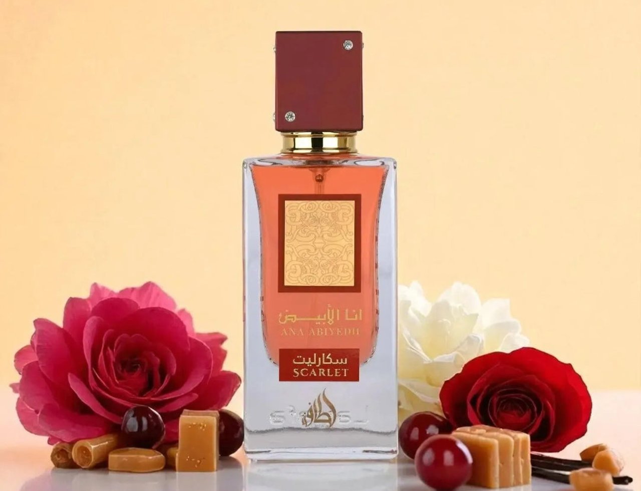 Lattafa Ana Abiyedh Scarlet by Lattafa 60ml EDP Women — Perfume bottle with orange liquid, red and white roses, caramel