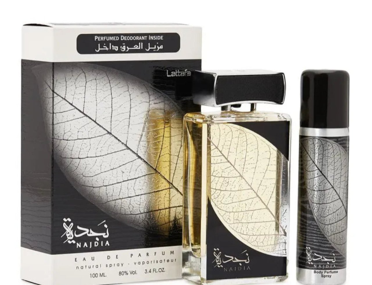 Lattafa Najdia — Perfume bottle and deodorant spray with a black box featuring a large silver and gold leaf design.