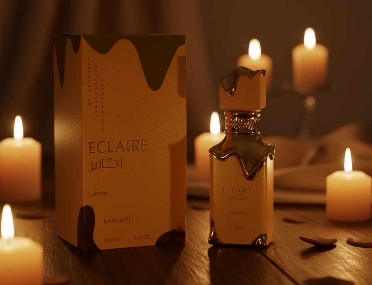 Lattafa Eclaire Banoffi — Perfume bottle and box on a wooden table with lit candles and scattered wooden petals.