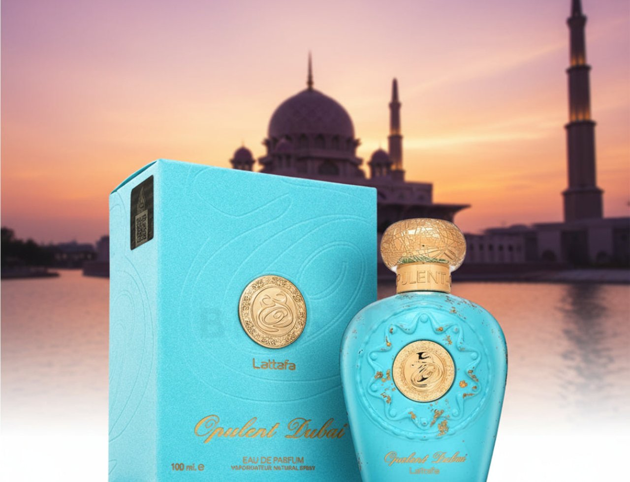 Lattafa Opulent Dubai by Lattafa Perfume 100ml — Turquoise perfume bottle and box with gold accents, set against a mosque and sunset background.