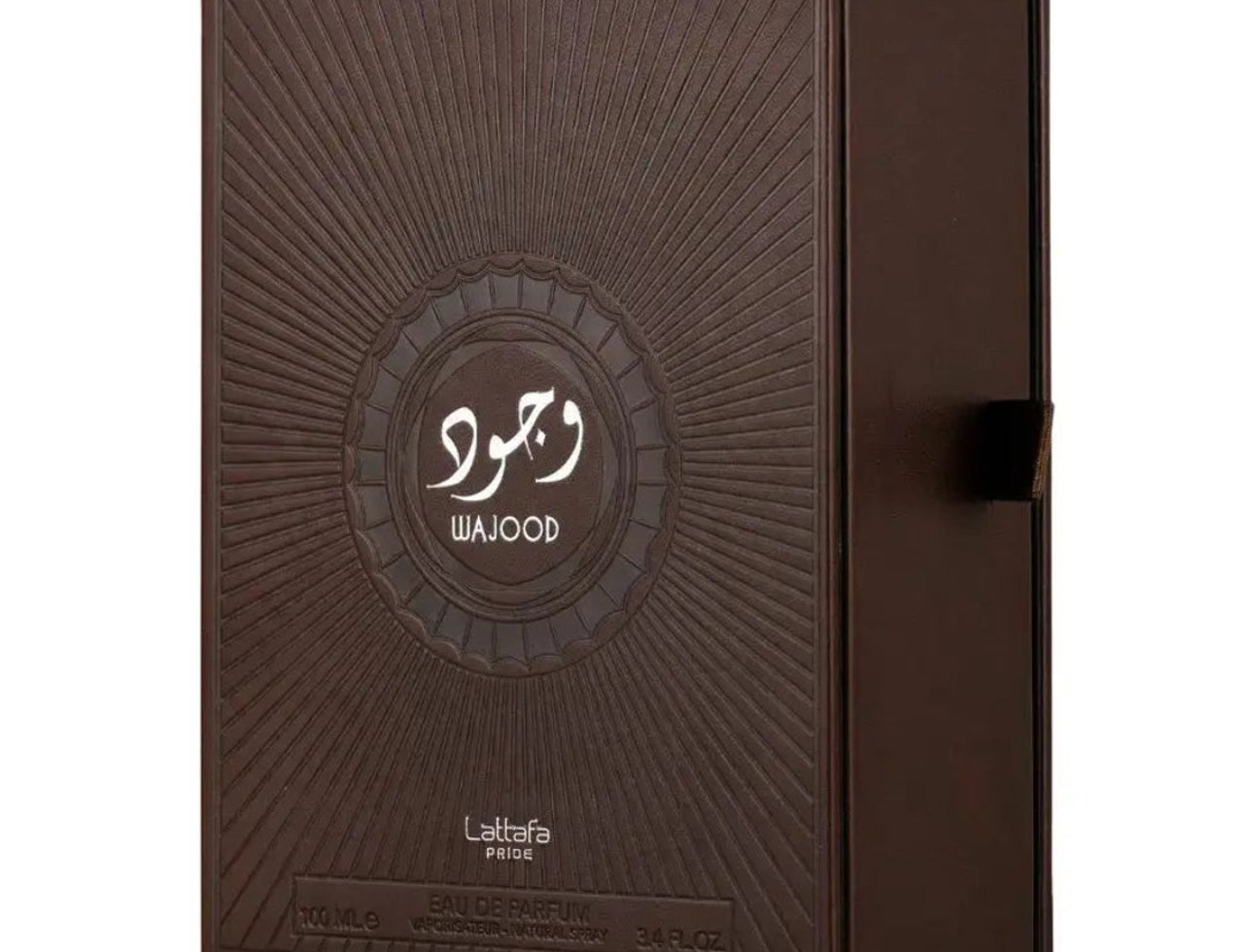 Lattafa Pride Wajood — Brown textured box with Arabic calligraphy and 'WAJOOD' text, showing 'Lattafa PRIDE' and volume details.