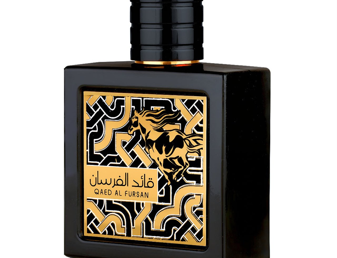 Lattafa Qaed Al Fursan by Lattafa 90ml for Men — Man in black shirt holding a black and gold perfume bottle, with pineapples, white flowers, and wood in the background.
