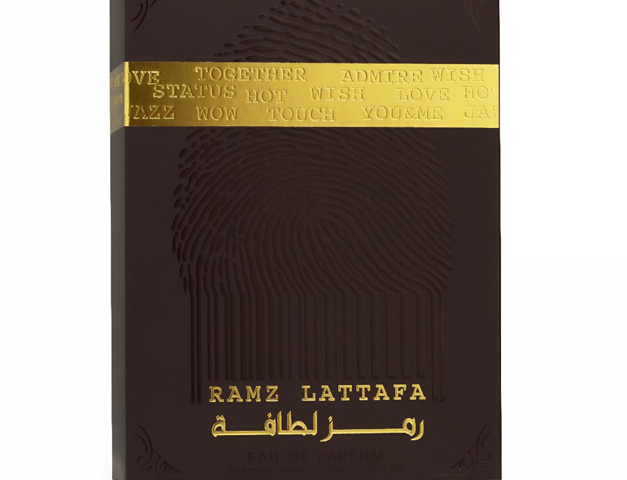 Lattafa Ramz Gold Lattafa Woman 100ml EDP — Kotak minyak wangi coklat gelap dengan corak cap jari dan tulisan emas timbul, menampilkan tulisan Arab dan Inggeris.