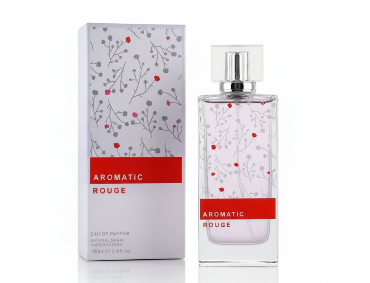 Maison Alhambra Aromatic Rouge by Maison Alhambra 100ml EDP — A perfume bottle and its box, both featuring a white background with delicate grey branches and small red and pink flowers. The box is on the left, and the bottle is on the right.