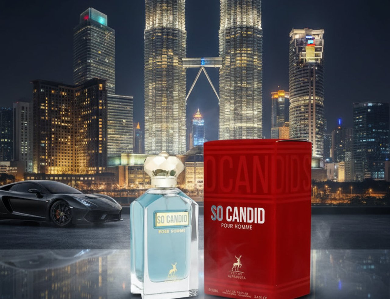 Maison Alhambra Candid Pour Homme — A clear glass perfume bottle with a gold faceted cap and a red box are displayed in front of the Petronas Twin Towers at night, with a black sports car on the left.