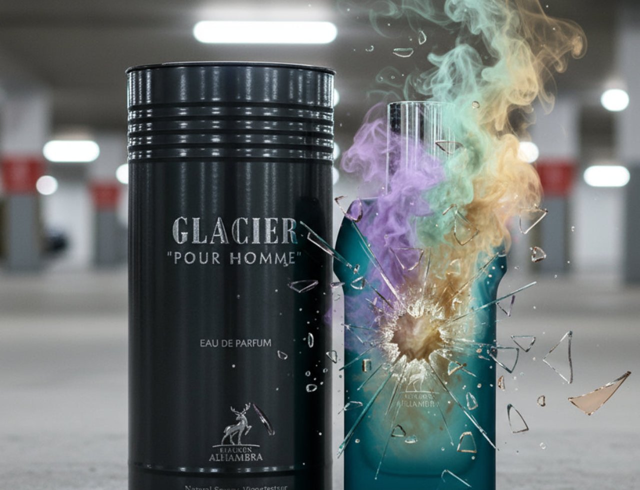 Maison Alhambra Glacier Pour Homme — Black cylindrical bottle next to a shattered teal bottle releasing colorful smoke and glass shards.
