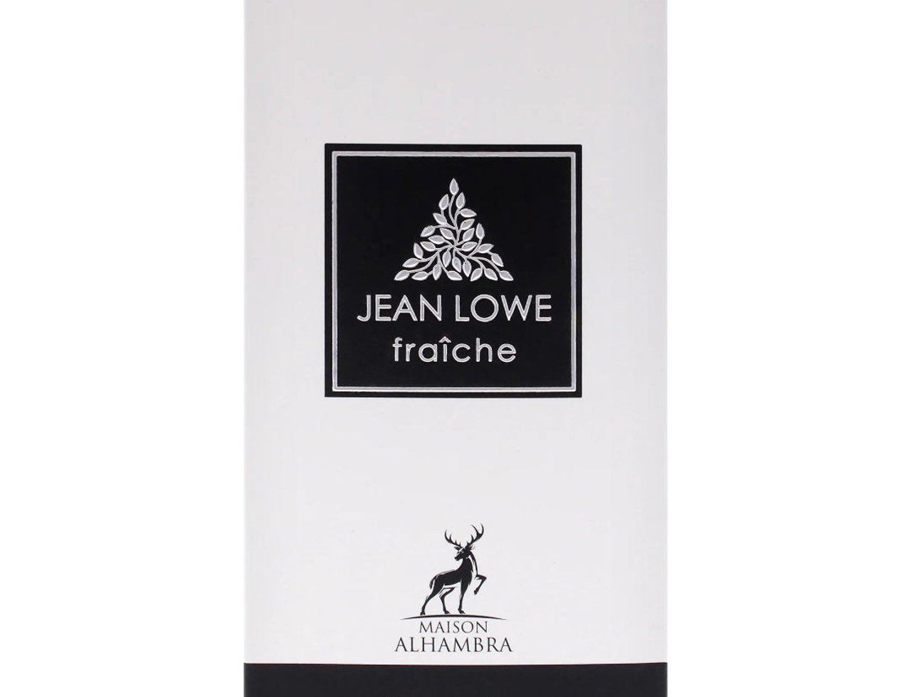 Maison Alhambra Jean Lowe Fraiche — Kotak putih dengan label hitam bersudut, memaparkan nama jenama dan motif daun, serta logo siluet rusa.
