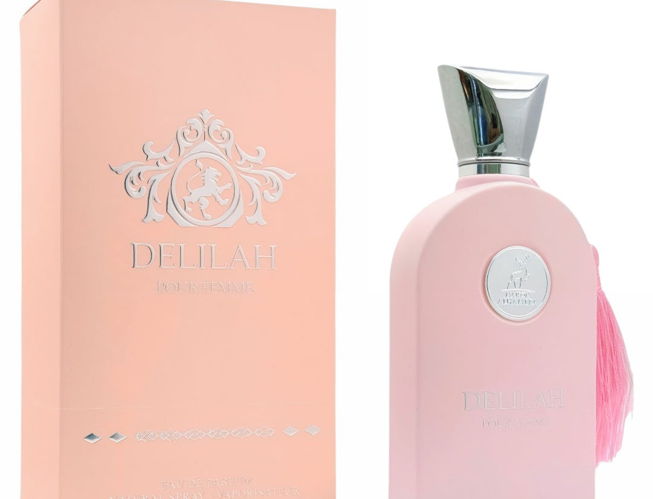 Maison Alhambra Delilah Pour Femme EDP 100ml – Minyak Wangi Wanita, menampilkan botol minyak wangi merah jambu dengan penutup perak dan rumbai merah jambu, bersama kotaknya yang sepadan.