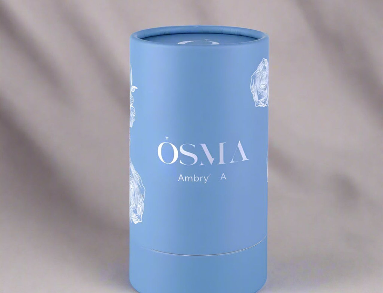 Osma Osma Ambry A Fresh & Fly 75ml EDP — A light blue cylindrical perfume box with white rose illustrations and the brand name 'OSMA' and product name 'Ambry' A' printed in white.