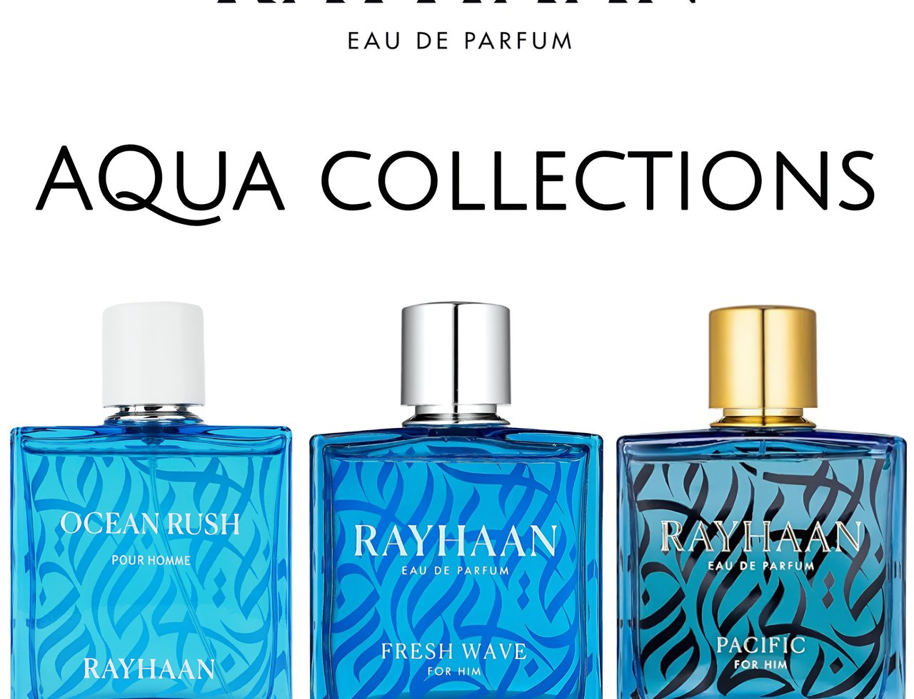 Koleksi Aqua Rayhaan — Tiga botol minyak wangi kaca biru dari Koleksi Aqua Rayhaan, menampilkan haruman 'Ocean Rush', 'Fresh Wave', dan 'Pacific' untuk lelaki.