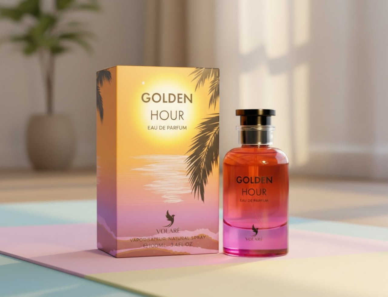 Volare Golden Hour by Volare 100ml EDP for Her — A perfume bottle and its box displayed on a pastel-colored surface, with a plant in the background.