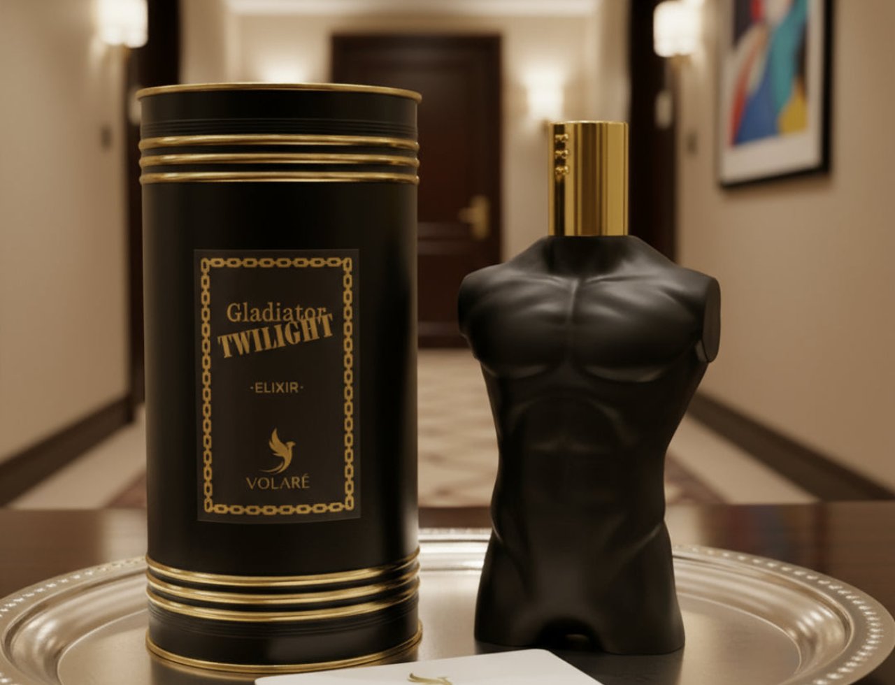 Volare Elixir Gladiator Twilight by Volare 100ml Man — Black torso-shaped perfume bottle with gold cap and matching cylindrical box on a silver tray, with a small white card.