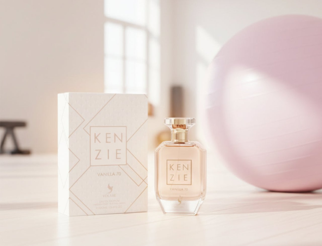 Volare Vanilla 70 Kenzie by Volare – 100 ml for Women perfume bottle and box with a pink exercise ball in the background