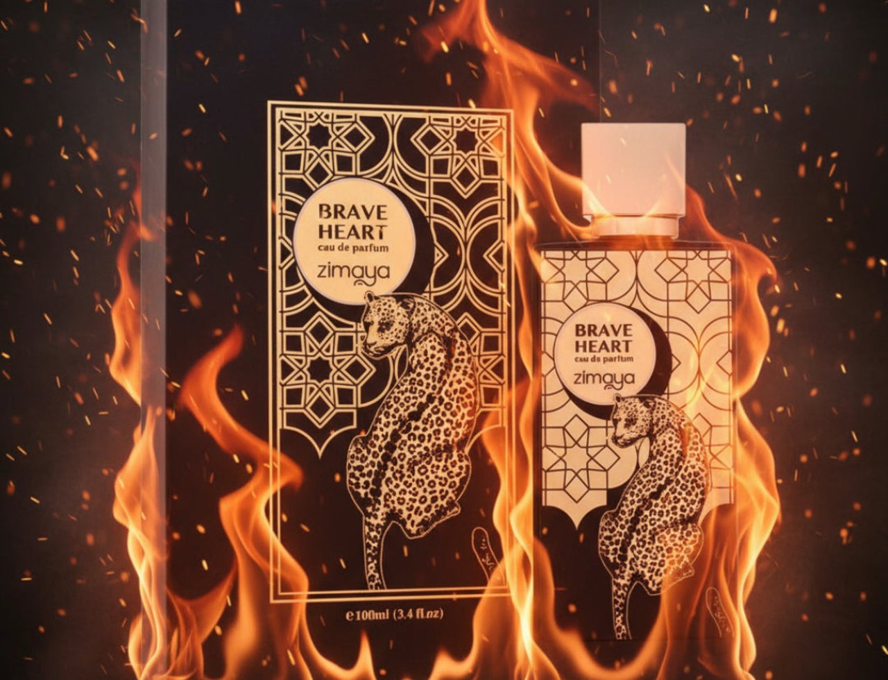 Zimaya Brave Heart by Zimaya EDP 100ml Unisex — A black box and bottle of Zimaya Brave Heart perfume, adorned with a leopard motif and geometric patterns, surrounded by dramatic flames and glowing embers.