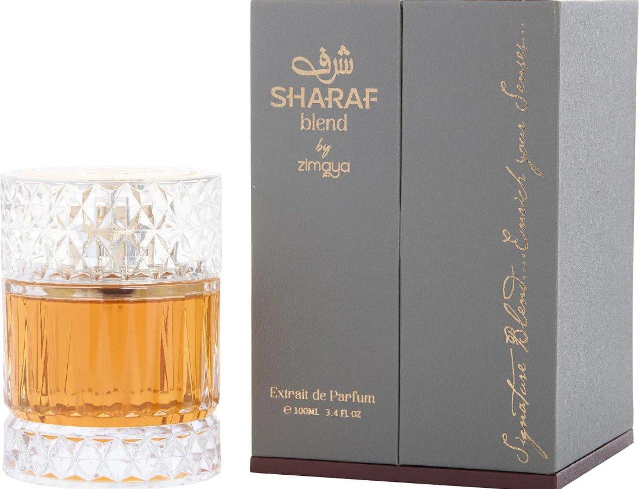 Zimaya Sharaf Blend by Zimaya 100ml Extrait de Parfum — Cecair keemasan dalam botol kaca berfaset dengan penutup bertekstur, bersebelahan kotak paparan kelabu dengan tulisan emas.