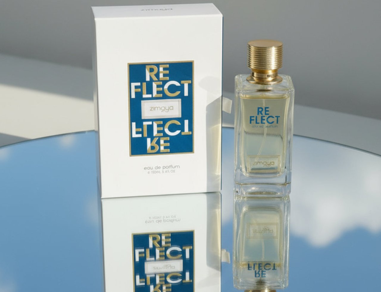 Zimaya Reflect by Zimaya 100ml EDP Unisex — White box and clear glass perfume bottle with gold cap, reflected on a mirrored surface.
