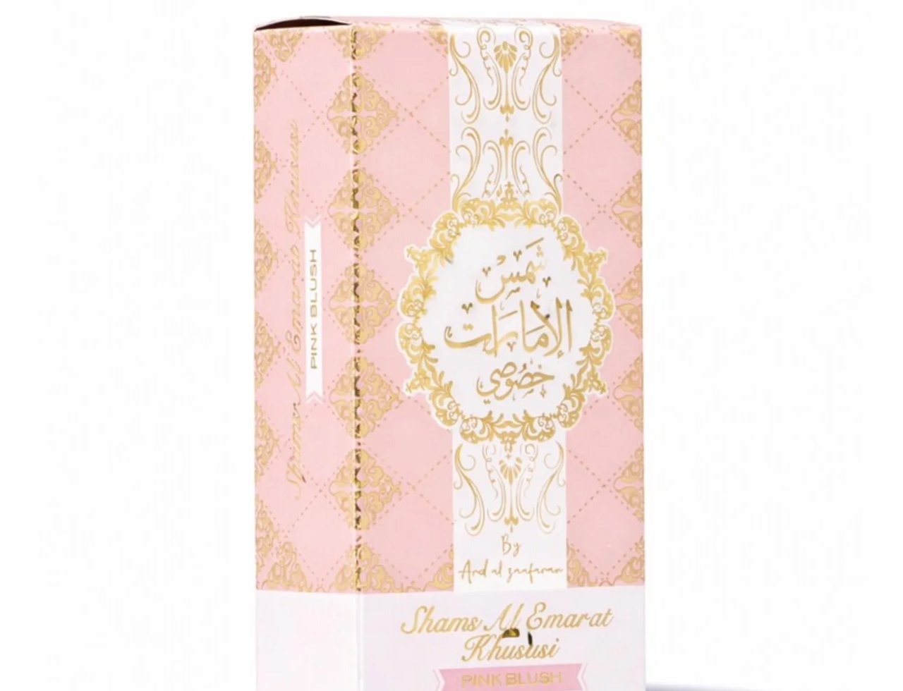 Ard Al Zaafaran Pink Blush Shams Al Emarat Khususi 50ml — Kotak merah jambu dengan corak emas rumit dan kaligrafi Arab, memaparkan teks "Pink Blush" dalam Bahasa Inggeris.