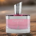 Maison Alhambra Euzonea by Maison Alhambra 100ml EDP for Women — Pink perfume bottle with silver cap and deer emblem on a sandy desert background