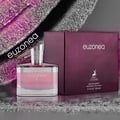 Maison Alhambra Euzonea by Maison Alhambra 100ml EDP for Women — A rectangular pink glass perfume bottle with a silver textured cap, next to its matching plum-colored box, set against a textured purple and grey background.
