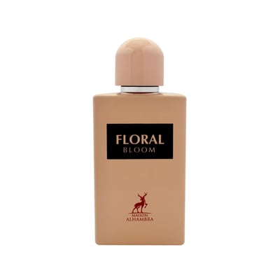 Maison Alhambra Floral Bloom — A light beige perfume bottle with a peach cap, featuring a black label with white text 'FLORAL BLOOM' and a red deer logo with 'MAISON ALHAMBRA' text below. | Maison Alhambra Floral Bloom — Botol minyak wangi berwarna beige muda dengan penutup pic, menampilkan label hitam dengan teks