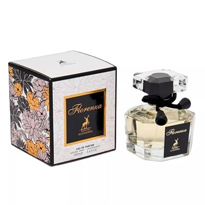 Maison Alhambra Florenza (Florence) 100ml — A floral patterned box sits next to a faceted glass perfume bottle with a black ribbon and a clear geometric cap. | Maison Alhambra Florenza (Florence) 100ml — Kotak bercorak bunga diletakkan di sebelah botol minyak wangi kaca berfaset dengan reben hitam dan penutup