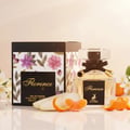Maison Alhambra Florenza (Florence) 100ml — A perfume bottle and its box are displayed with sliced pear and mandarin orange segments in front, set against a soft, gradient background with subtle bokeh effects. | Maison Alhambra Florenza (Florence) 100ml — Sebotol minyak wangi dan kotaknya dipamerkan bersama hirisan