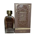 Ard Al Zaafaran Hayaati Oud by Ard Al Zaafaran 100ml EDP Unisex — Brown perfume bottle with gold cap and ornate brown box with gold accents, both featuring intricate leaf patterns and Arabic calligraphy.
