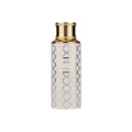 Maison Asrar Heritage by Maison Asrar 100ml EDP Unisex — Botol putih corak geometri emas dan penutup berjalur emas, label tertulis HERITAGE ROYAL COLLECTION
