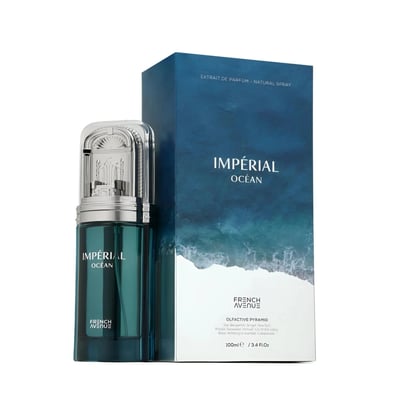 French Avenue Imperial Ocean — Teal glass perfume bottle with ornate silver cap next to a blue box featuring ocean waves and scent notes.