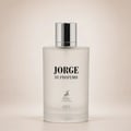 Maison Alhambra Jorge Di Profumo Aqua — Frosted glass perfume bottle with a silver cap, featuring black text "JORGE DI PROFUMO" and a deer logo with "MAISON ALHAMBRA" and "AQUA" below. | Botol minyak wangi kaca beku dengan penutup perak, menampilkan teks hitam "JORGE DI PROFUMO" dan logo rusa dengan "MAISON ALHAMBRA"