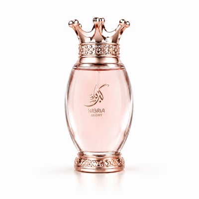 Zimaya Kibria Glory by Zimaya 100ml Women — Rose gold crown cap with crystals, clear glass bottle with pink liquid, Arabic calligraphy and text 'KIBRIA GLORY' in gold