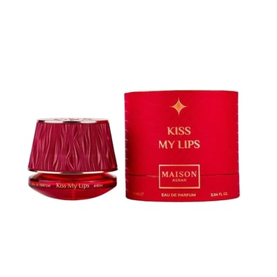 Maison Asrar Kiss My Lips by Maison Asrar 90ml EDP Unisex — Red textured perfume bottle with gold accents next to a matching red cylindrical box with gold star and text.
