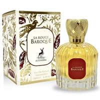 Maison Alhambra La Rouge Baroque 100ml — A perfume bottle with a gold patterned cap and a red label sits next to its ornate white and gold patterned box featuring birds and foliage. | Maison Alhambra La Rouge Baroque 100ml — Botol minyak wangi dengan penutup berona emas dan label merah duduk bersebelahan dengan kotak