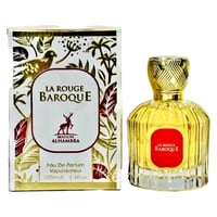 Maison Alhambra La Rouge Baroque 100ml — A perfume bottle with a gold patterned cap and a red label sits next to its ornate white and gold patterned box featuring birds and foliage. | Maison Alhambra La Rouge Baroque 100ml — Botol minyak wangi dengan penutup berona emas dan label merah duduk bersebelahan dengan kotak
