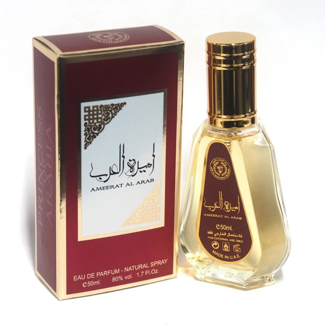 Ard Al Zaafaran Ameerat Al Arab Princess of Arabia 50ml — Kotak merah berlatar emas dengan tulisan Arab dan Inggeris, serta botol kaca jernih berisi cecair keemasan dengan penutup emas.