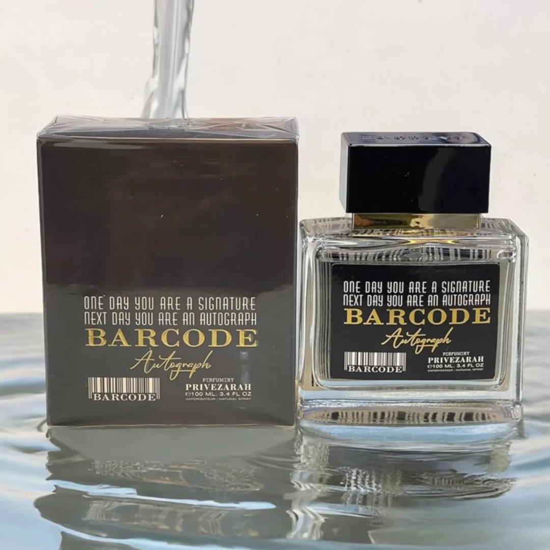 Paris Corner Autograph 100ml — A perfume box and bottle are displayed on a reflective surface with water effects, with a stream of water pouring from above. | Paris Corner Autograph 100ml — Kotak dan botol minyak wangi dipamerkan di permukaan reflektif dengan kesan air, dengan aliran air mengalir dari atas.