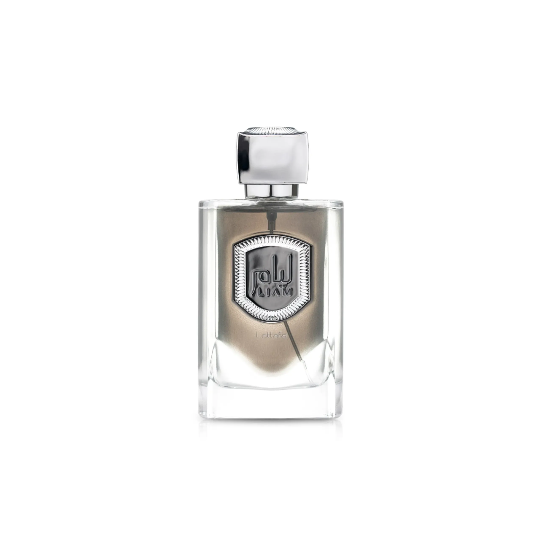 Lattafa Liam Grey by Lattafa 100ml EDP — Clear glass perfume bottle with a silver emblem featuring Arabic script and 'LIAM' below, topped with a silver cap, against a white background.