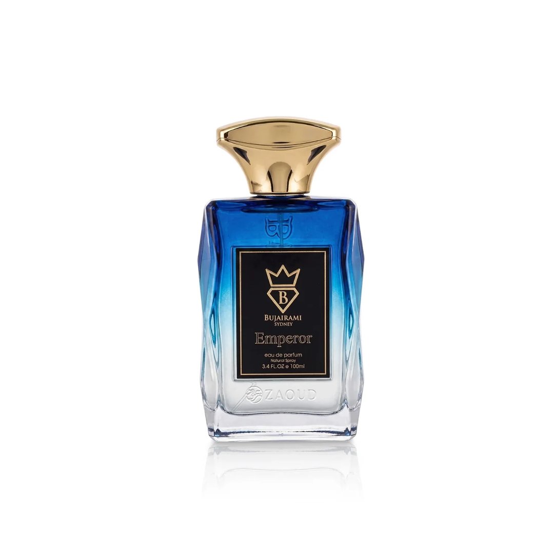 Bujairami Emperor by Bujairami 100ml EDP — A blue and clear glass perfume bottle with a gold cap, featuring a black label with gold crown and text.