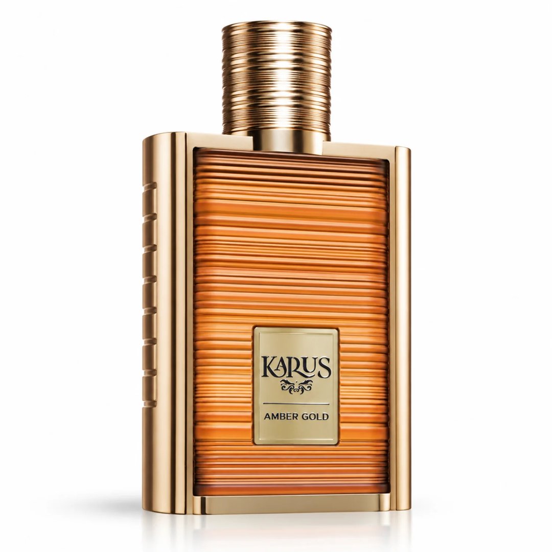 Khadlaj Karus Amber Gold 100ml EDP Unisex — A rectangular gold-trimmed perfume bottle with a textured amber-colored body and a fluted gold cap, featuring a gold label with black text reading 'KARUS AMBER GOLD'.