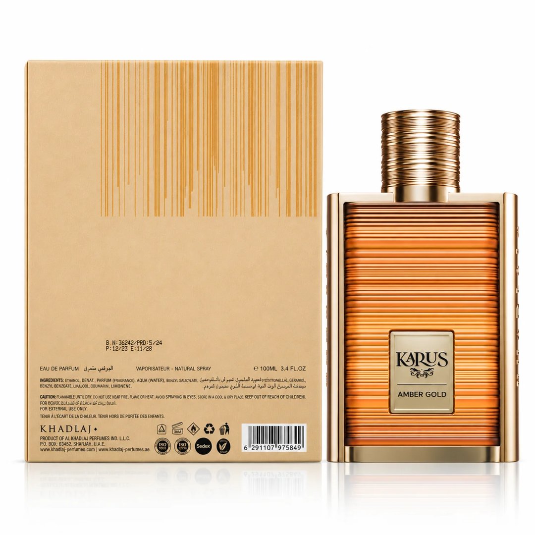 Khadlaj Karus Amber Gold EDP Unisex — A 100ml bottle of amber-colored perfume with a ribbed gold cap, presented next to its matching beige cardboard box with vertical gold lines.