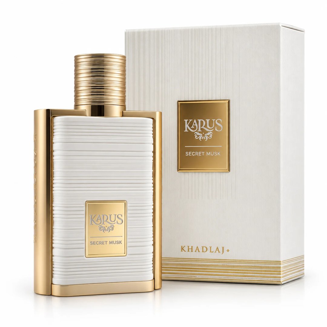 Khadlaj Karus Secret Musk EDP Unisex — White ribbed bottle with gold accents and cap, next to its matching white and gold ribbed box.