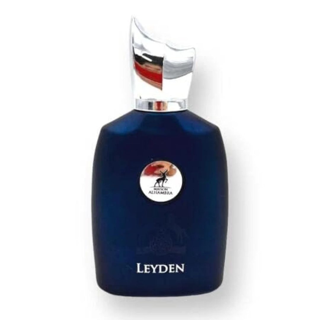 Maison Alhambra Leyden by Maison Alhambra Eau De Parfum 100ml — A dark blue perfume bottle with a silver cap and a circular label featuring a deer silhouette against a sunset | Maison Alhambra Leyden by Maison Alhambra Eau De Parfum 100ml — Botol minyak wangi biru gelap dengan penutup perak dan label bulat menampilkan